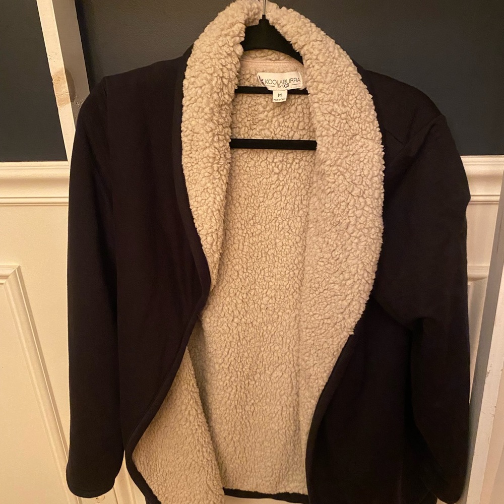 Koolaburra by Ugg- sherpa lined with two pockets.